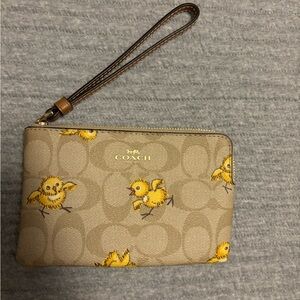 Coach Tan Wristlet with Yellow Chick Design